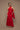 Fatale brick-red scarf dress