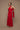 Fatale brick-red scarf dress